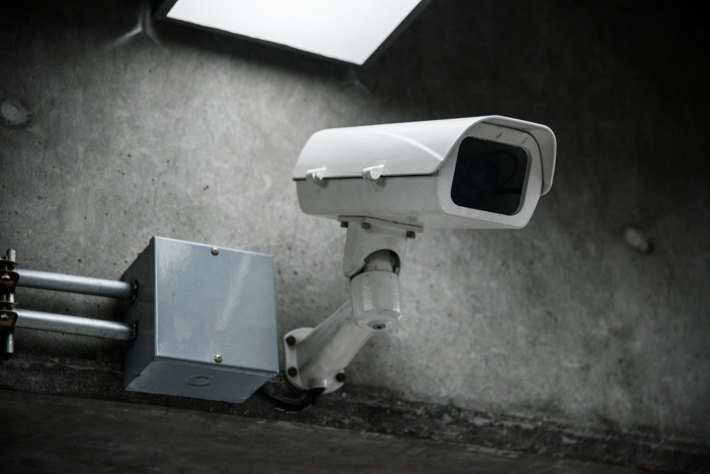 closeup cctv camera wall